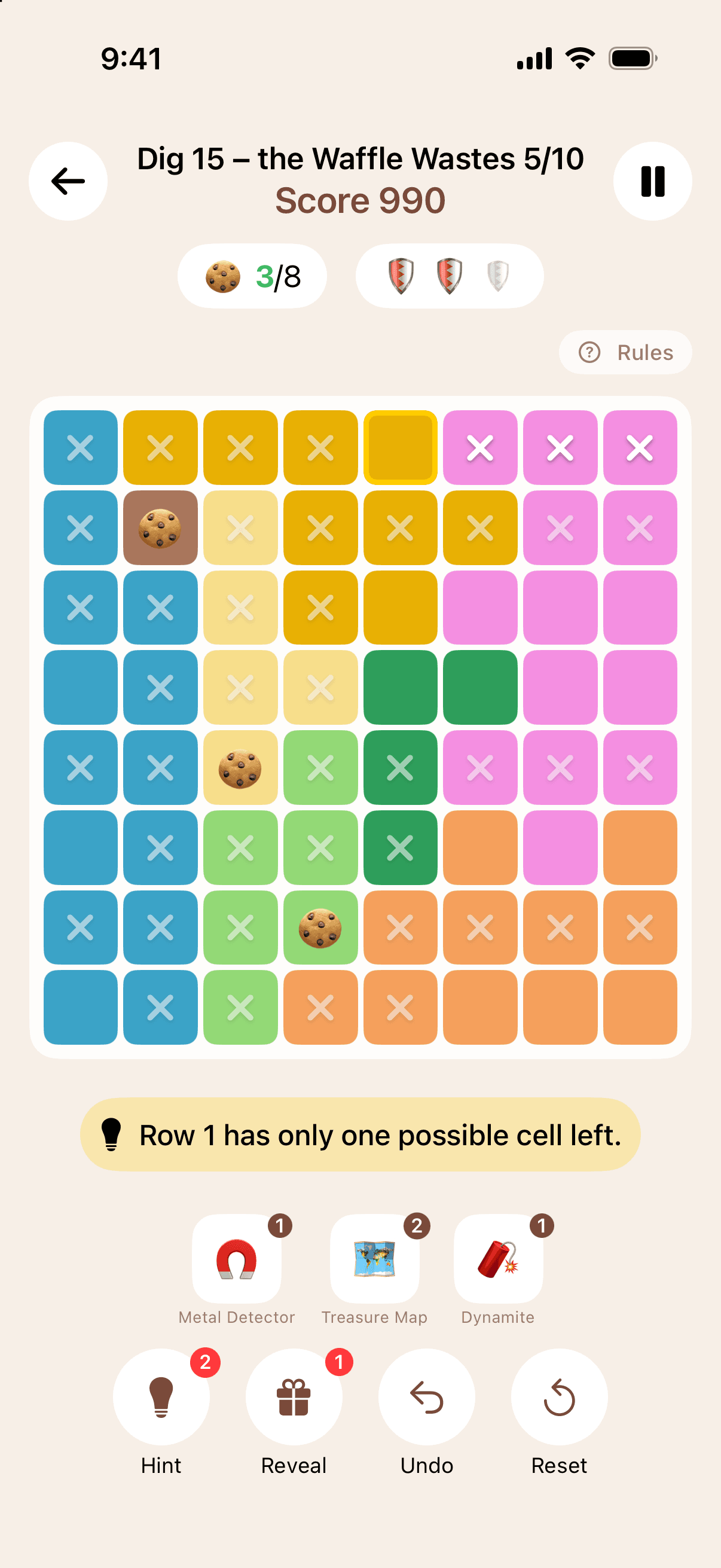 An Emoji Hunt board mid-game: cookies found, X marks and a hint